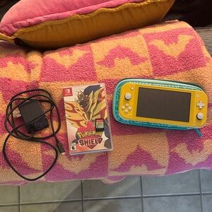 Nintendo Switch Lite Yellow with Animal Crossing Case and Pokémon Shield